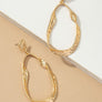 Statement hammered twisted metal hoop earrings
