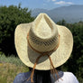 Cowboy hat in handwoven straw with a peekaboo pa