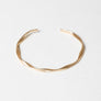 Matte Gold Twist Bangle With Sleek Design
