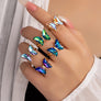 Butterfly ring with adjustable brass band