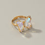Butterfly ring with adjustable brass band