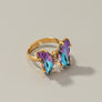 Butterfly ring with adjustable brass band
