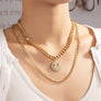 Two necklaces set with cuban chain and smiley face