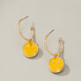 Smiley face charm hoop earrings