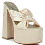 STROBING KNOTTED CHUNKY PLATFORM HEELS