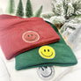 SEQUINED SMILEY FACE BEANIE