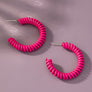 Spiral metal hoop earrings with color coating