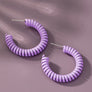 Spiral metal hoop earrings with color coating