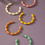 Spindle shape wood beaded hoop earrings
