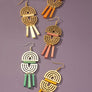 Double arch metal earrings with wood sticks