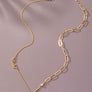 Asymmetric delicate necklace with heart pendant