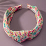 B A C K I N S T O C K Pleaded flora headband