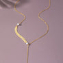 Asymmetric chain necklace with pearl drop