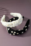 Knotted fabric headband with daisy decor
