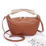 Gold Bar Handle Iconic Swing Bag