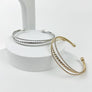 OPEN METAL CUFF BRAIDED BRACELET