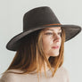 Faux suede wide brim panama hat with braided band