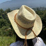 Cowboy hat in handwoven straw with a peekaboo pa