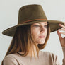 Faux suede wide brim panama hat with braided band