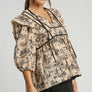 Umgee Ruffled Tie Neck Puff Sleeve Babydoll Blouse