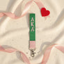 AKA Green Canvas Embroidered Wristlet Strap Clip