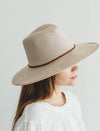 Faux suede wide brim panama hat with braided band