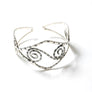 Spiral Silver Arm Cuff With Intricate Design