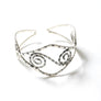 Spiral Silver Arm Cuff With Intricate Design