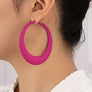 Large color coated puffy hoop earrings