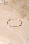 Matte Gold Twist Bangle With Sleek Design