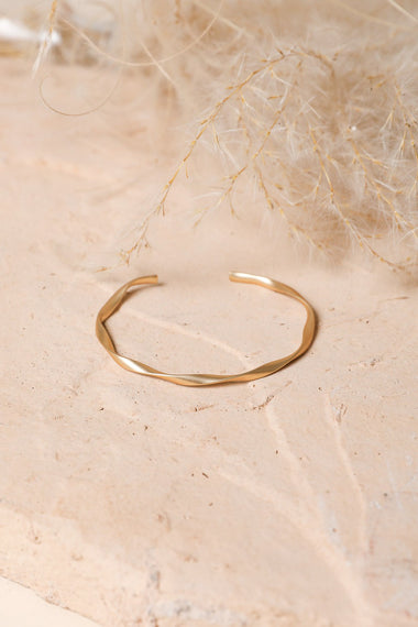 Matte Gold Twist Bangle With Sleek Design