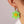 Huggie hoop dangling flower smiley face earrings