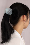 Frosty daisy flower hair claw clip