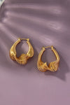 Twisted spring hoop earrings