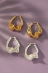 Twisted spring hoop earrings