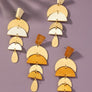 Linear wood and metal drop earrings