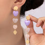 Mixed media heart linear drop earrings
