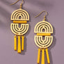 Double arch metal earrings with wood sticks
