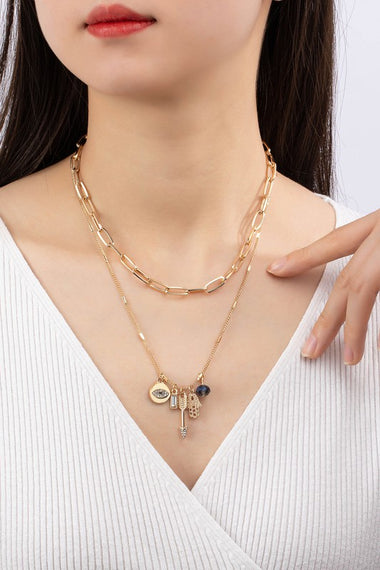 2 necklaces set with various charms