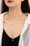 Asymmetric chain necklace with pearl drop