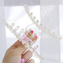 Modern pearl claw-hair upstyle-Large Clear