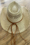 Cowboy  hat in handwoven  straw with a peekaboo pa