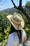 Cowboy  hat in handwoven  straw with a peekaboo pa