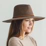 Faux suede wide brim panama hat with braided band