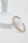 OPEN METAL CUFF BRAIDED BRACELET