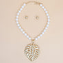 Cream Pearl Gold Palm Leaf Pendant Necklace