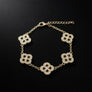 Black Encrusted Quatrefoil Motif Gold Bracelet