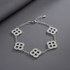 Black Encrusted Quatrefoil Motif Silver Bracelet