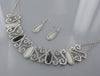 Rhinestone and Multi Tone Acrylic Bead Drape Necklace and Earring Set