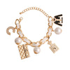 Gold and White Perfume Charm Bracelet